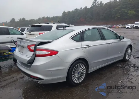 2014 Ford Fusion Hybrid Titanium z USA, uszkodzony, nr VIN 3FA6P0RUXER274315